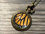 Real monarch butterfly wing necklace Ethically sourced taxidermy jewelry Steampunk pocket watch style necklace Pressed flower necklace