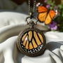 Real monarch butterfly wing necklace Ethically sourced taxidermy jewelry Steampunk pocket watch style necklace Pressed flower necklace