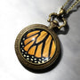 Real monarch butterfly wing necklace Ethically sourced taxidermy jewelry Steampunk pocket watch style necklace Pressed flower necklace